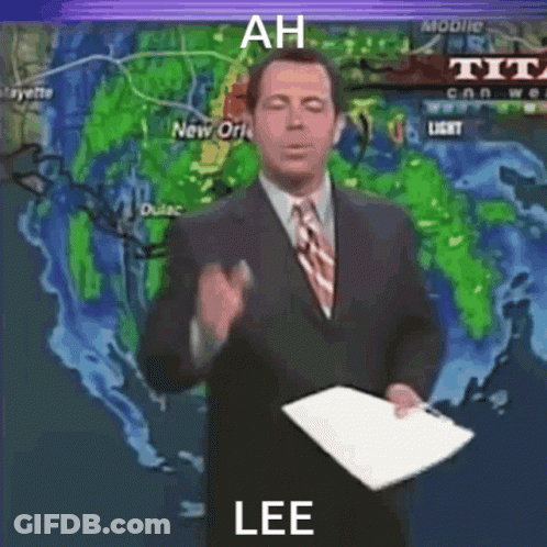 Man In Suit Holding Paper In Front Of USA Map GIF