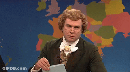 Man In Suit Holding Paper In Front Of World Map GIF