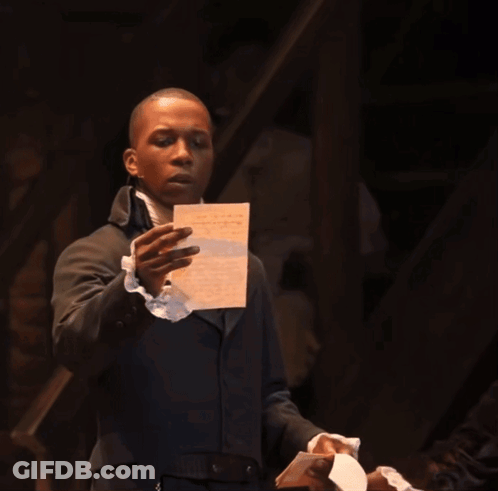 Man In Suit Holding Paper GIF