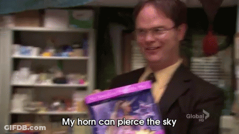 Man In Suit Holding Pink Bag Saying My Horn Can Pierce The Sky GIF