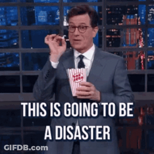 Man In Suit Holding Popcorn This Is Disaster GIF