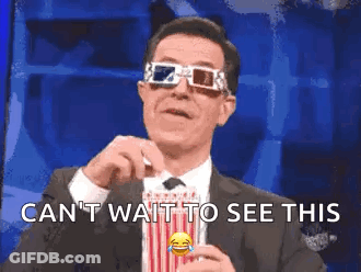 Man In Suit Holding Popcorn With 3D Glasses GIF