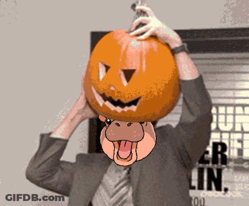 Man In Suit Holding Pumpkin On Head GIF