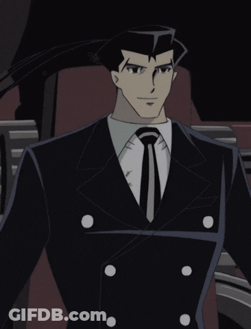 Man In Suit Holding Purple Object GIF