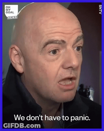 Man In Suit Holding Qatar Airways Soccer Ball GIF