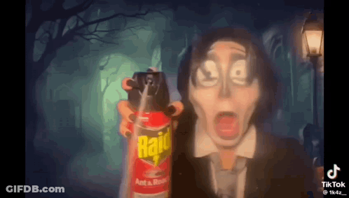 Man In Suit Holding Raid Insecticide GIF