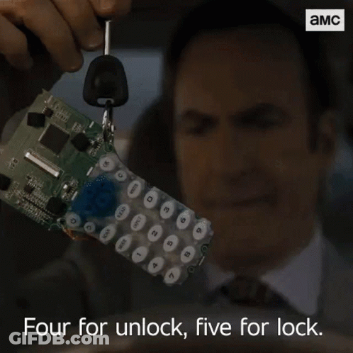 Man In Suit Holding Remote Saying Four For Unlock Five For Lock GIF