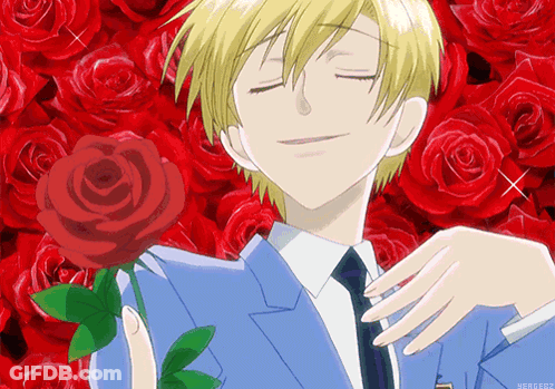 Man In Suit Holding Rose GIF