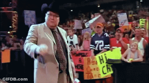 Man In Suit Holding Sign Saying A Man Hi GIF