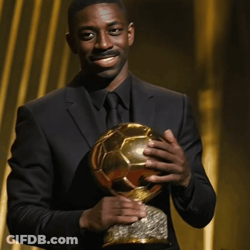 Man In Suit Holding Soccer Ball GIF
