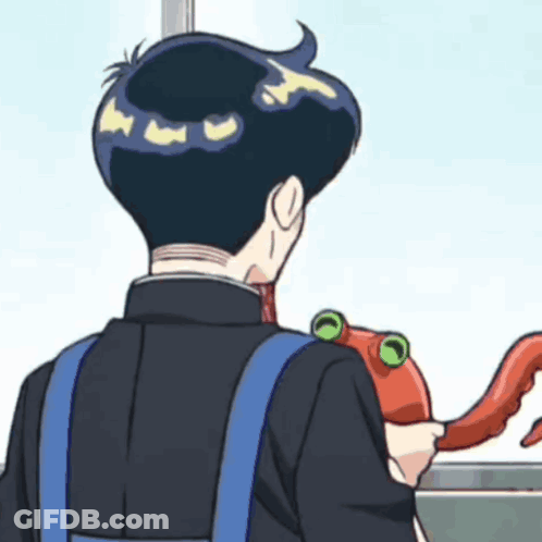 Man In Suit Holding Stuffed Octopus GIF