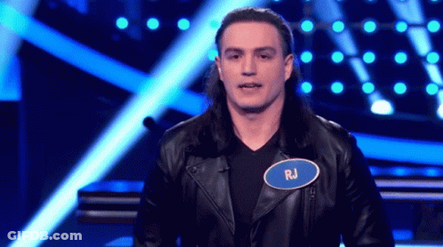Man In Suit Holding Trophy Security Sign GIF