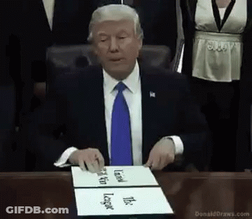 Man In Suit Holding Trophy With Athletes GIF