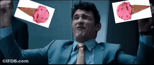 Man In Suit Holding Two Pink Ice Cream Cones GIF