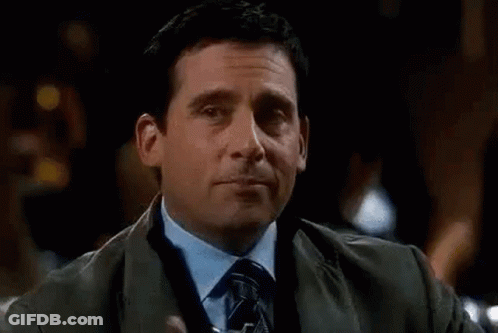 Man In Suit Holding Water GIF