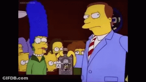 Man In Suit Holding Whiskey In Front Of Simpsons Characters GIF