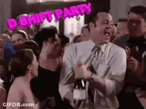 Man In Suit Holding Wine Bottle GIF