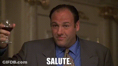 Man In Suit Holding Wine Glass GIF