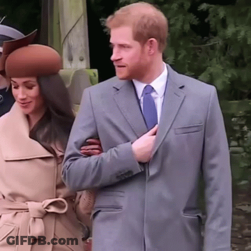 Man In Suit Holding Woman's Hand GIF