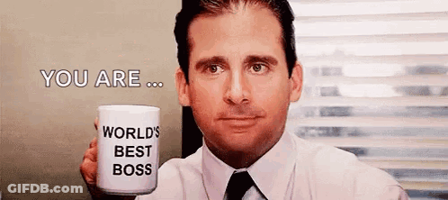 Man In Suit Holding World's Best Boss Mug GIF