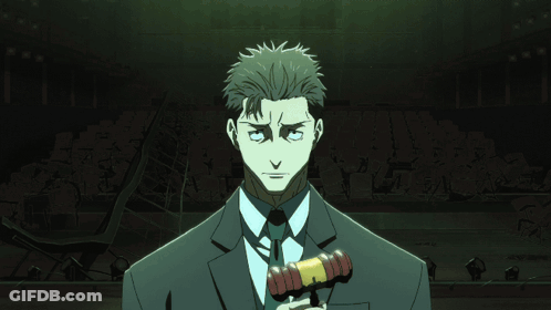 Man In Suit Holding Yellow Object To Mouth GIF