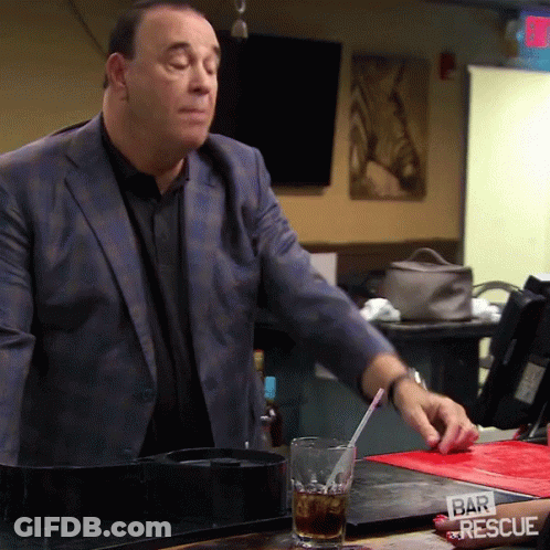 Man In Suit Holds Straw Over Glass Saying Bar And Rescue GIF