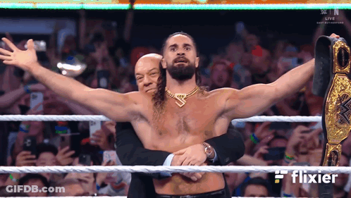 Man In Suit Hugging Man In Wrestling Ring Flixier GIF
