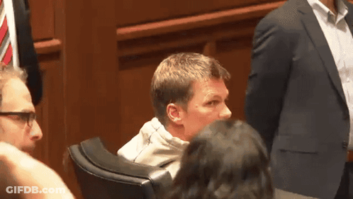 Man In Suit In Courtroom GIF