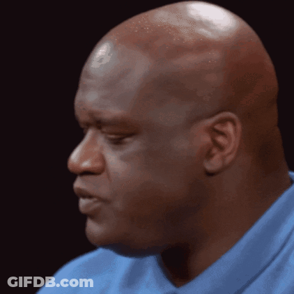 Man In Suit In Dark Room With Backlight GIF