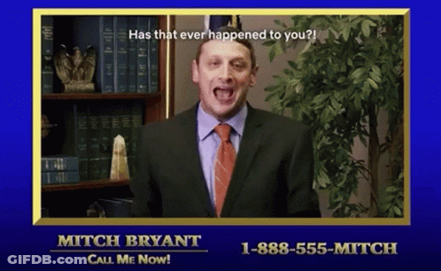 Man In Suit In Front Of Bookshelf Saying Has That Ever Happened To You GIF