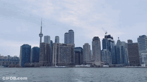 Man In Suit In Front Of British Flag GIF