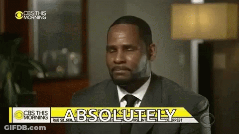 Man In Suit In Front Of CBS This Morning Sign GIF