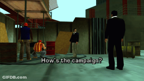 Man In Suit In Front Of Construction Workers How's The Campaign GIF