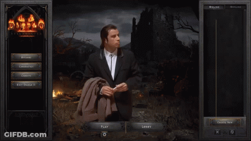 Man In Suit In Front Of Diablo 2 Screen GIF