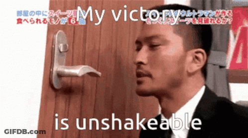 Man In Suit In Front Of Door Saying My Victor Is Unshakeable GIF