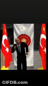 Man In Suit In Front Of Flag Letter C GIF