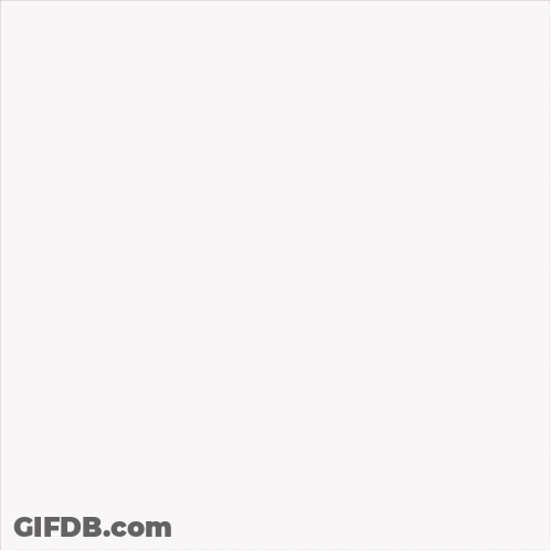 Man In Suit In Front Of Netflix Logo GIF