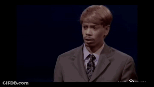 Man In Suit In Front Of Purple Number 3 GIF