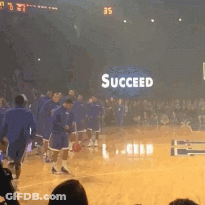 Man In Suit In Front Of SEC Logo GIF
