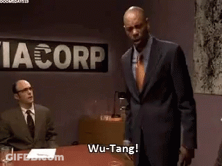 Man In Suit In Front Of Via Corp Sign GIF