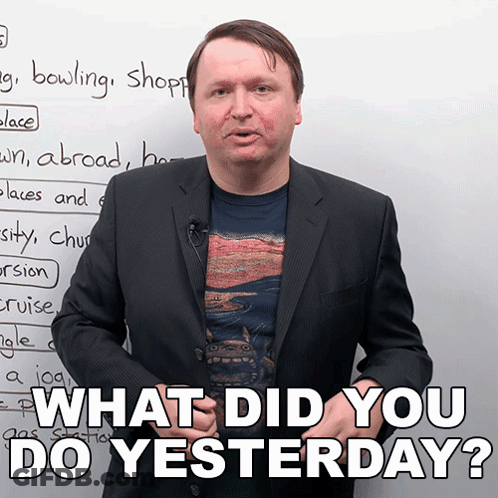 Man In Suit In Front Of Whiteboard Saying What Did You Do Yesterday GIF