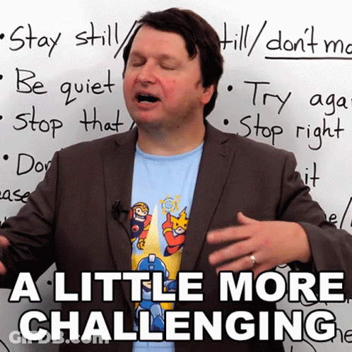 Man In Suit In Front Of Whiteboard With A Little More Challenging GIF