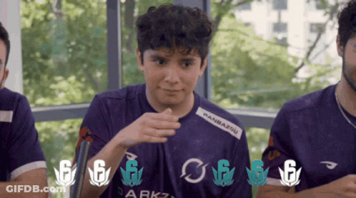 Man In Suit In Hallway With FC Bayern.tv GIF