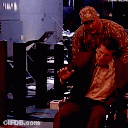 Man In Suit In Wheelchair With Man In Military Uniform GIF