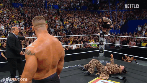 Man In Suit In Wrestling Ring With Netflix GIF