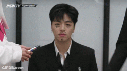 Man In Suit Interviewed By Woman On Ikon TV GIF
