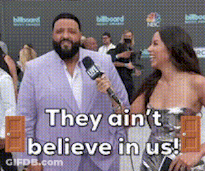 Man In Suit Interviewed By Woman Saying They Ain't Believe In Us GIF