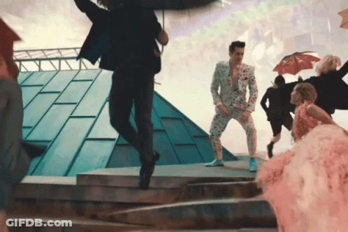 Man In Suit Jumping GIF