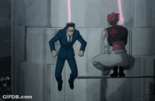 Man In Suit Jumping Over Squatting Man GIF