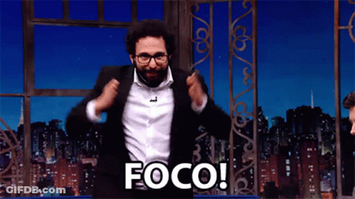 Man In Suit Jumping With Foco GIF